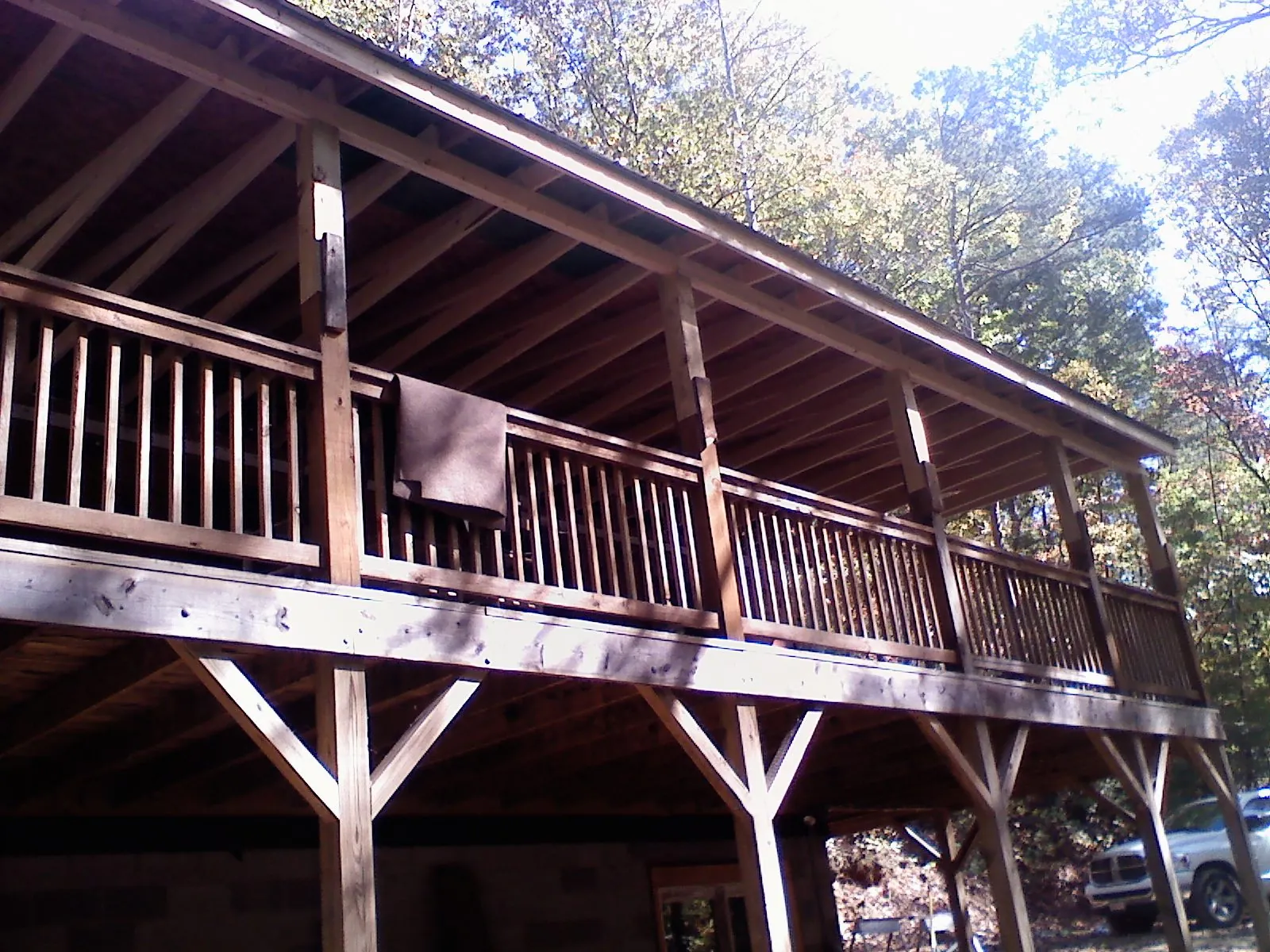 Timber framing under a new elevated porch and deck — Roof Leak Repair in Elkin by Roofing Brothers